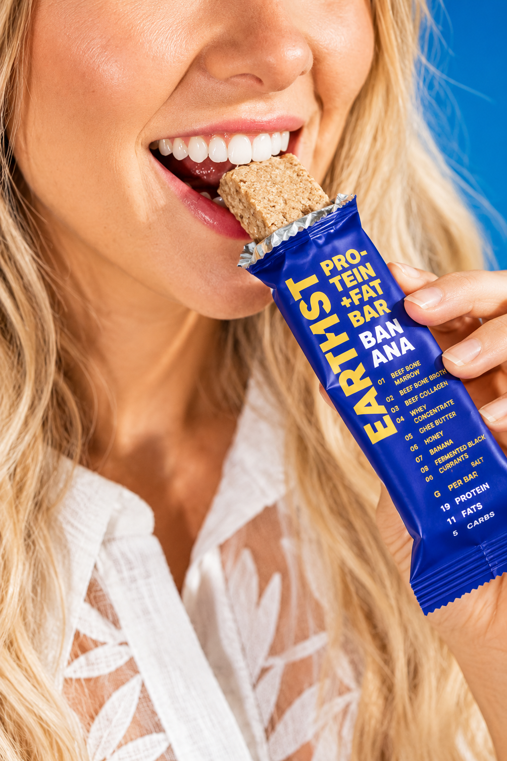 A young woman enjoying an EARTHIST Banana bar